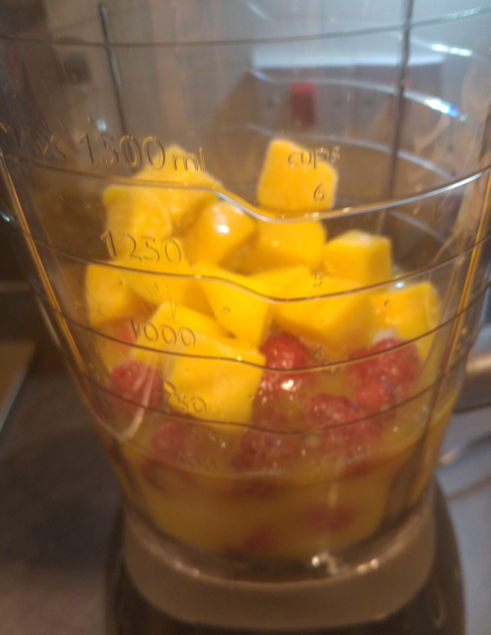 Orange, Mango & Raspberry smoothie - a week worth of smoothie recipes