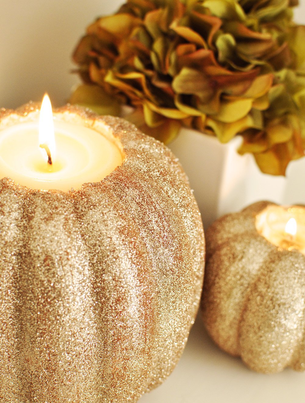 glitter pumpkin candle holders - 5 fun ideas for pumpkins this fall 