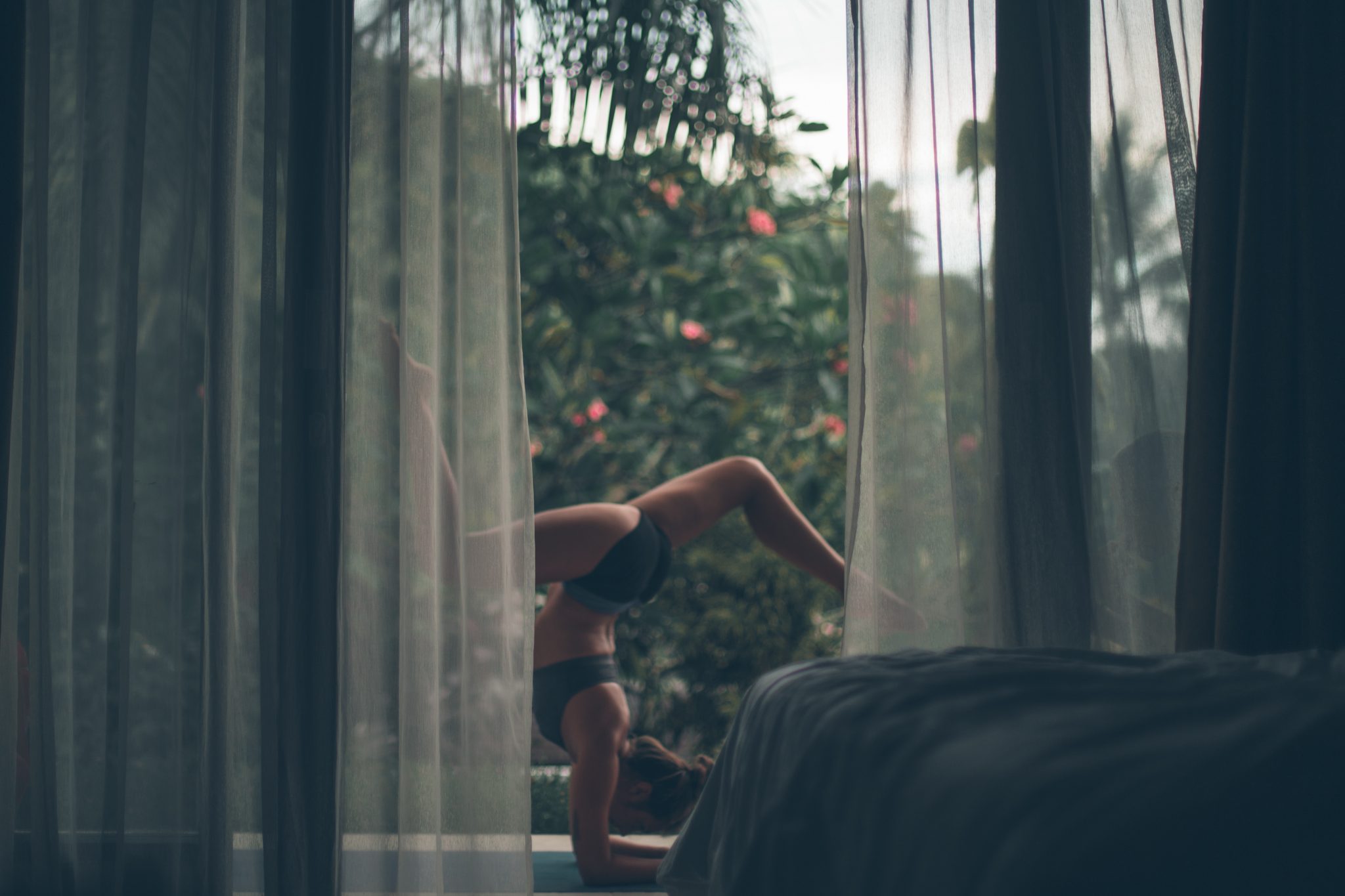 woman doing yoga as a home workout